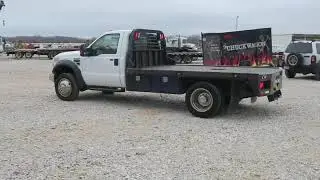 2010 Ford F450 Super Duty flatbed truck for sale at auction | bidding closes February 5, 2020