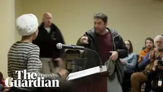 Security tackles man who sprayed unidentified liquid on Ilhan Omar at town hall