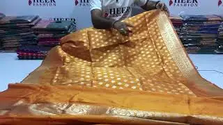 Soft banarasi silk saree with gold zari weaving work.