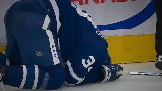 Auston Matthews Takes A Knee/Arm To The Back Of The Head Late In The Third Period