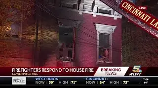 Firefighters extinguish flames at Lower Price Hill home early Sunday morning