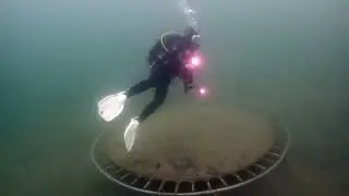 Having fun on a trampoline while SCUBA diving @Miracle Waters Diving Quarry, Brits