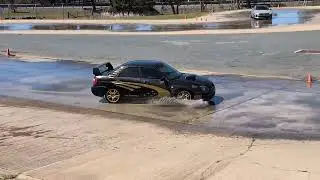 Kia Stinger and WRX drifting at the skidpan