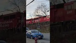 Canadian pacifc triple header charging up a hill carrying a manifest train with emd set? #emd #train