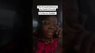 This Present Darkness by Frank Peretti