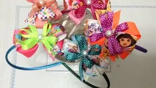 Diadema con moño chico de personaje para bebe VIDEO No. 110