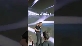 Elon Musk with Baby X