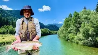 Fly fishing for trout on Sava Bohinjka in Slovenia