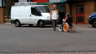 Handbikes/Handcycles Victoria's third time using her new handcycle The smile says it all