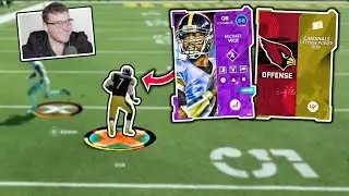 Mike Vick with the Cardinals playbook makes opponents want to put their Madden copy on eBay