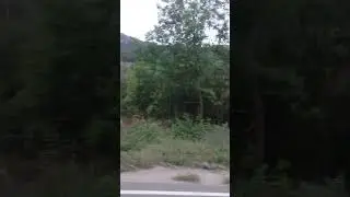 Вулкан и горы Карадаг в Крыму из окна автомобиля Karadag volcano mountains in Crimea from car window