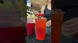 a classic shirley temple 🍒❤️ made with sprite, grenadine, real lime and maraschino cherries 🫶🏼