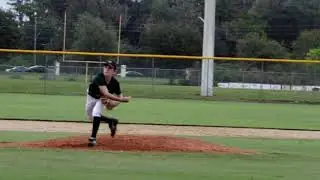 Warning up to pitch Trinity Catholic vs Vanguard