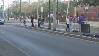 Paradegoers line up on St. Charles in New Orleans, how to recycle beads and throws