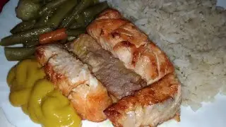 Salmon, rice, vegetables and salad.