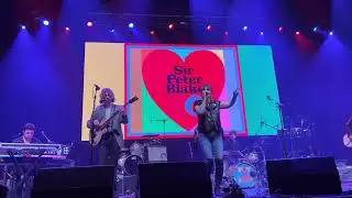 Chrissie Hynde performing a cover of the Minder theme, at the Royal Festival Hall for Peter Blake.