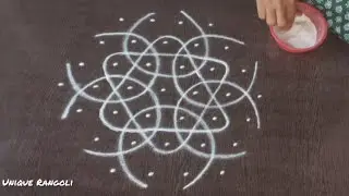Sikku kolam with 7&times;4 interlaced dots|7 Chukkala Melikala muggu|Simple Melikala muggu|Unique Rangoli
