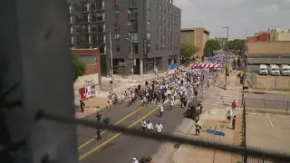 New group of migrants arrives in El Salvador, residents take to the streets in downtown Dallas