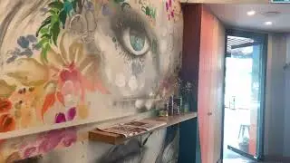 Custom Facade with Matching Wall Art and Graffiti Thoroughfare