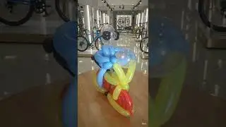 Balloon Cycle With Rider, made by Zoomalata, design by Joe Lefler. Veo added the showroom
