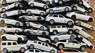 Various White Diecast Model Cars From The Box