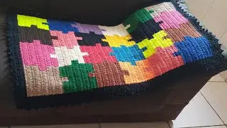 Tapete em crochê quebra - cabeça