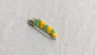 Crochet safety pin brooch/ Prada's crochet safety pin brooch 