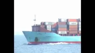 The Post Panamax Containership OLUF M&AElig;RSK Passing By