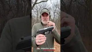 How does the HK P9S roller delayed handgun work?