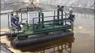 Lagoon dredging with sludge robot