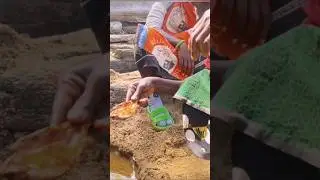 Surviving Nature&rsquo;s Challenge: Woman&rsquo;s Simple Act of Drinking Puddle Water#africa #shorts