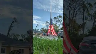 raising a American flag. 20 ft x 38 ft 75 ft. pole