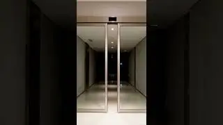 Automatic sliding glass doors at night