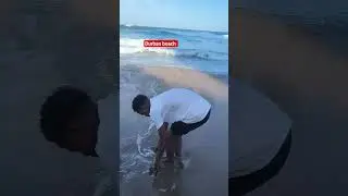 Durban beach, my kids playing with sand ..#durban #oceanwaves #ocean #durbantourism