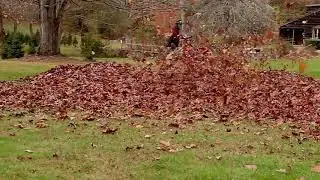Fradan RB-23VG Stand on Leaf Blower Blowing Leaves