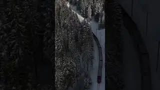 Swiss RhB train drives through winter wonderland near Davos | DJI Mini 3 Pro