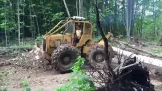 Skidding a couple of loads, nasty deadfall trees.  PowerModz!