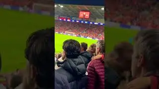 Wales fans belt out national anthem vs Belgium.