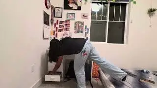 Body mechanics of picking a file from the bottom drawer