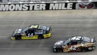 Tony Stewart beats out Montoya in the final laps at Dover