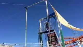 Flying gracefully in my first trapeze class.