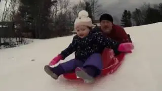 Charlotte Sledding on the Big Hill