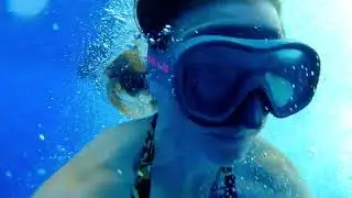 OLFI one five black snorkeling in the ocean
