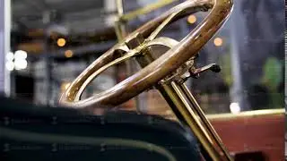 Close up of classic car details at the exhibition. Media. Retro cabriolet car and the golden