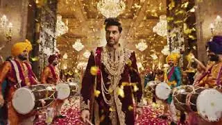 A video of a hero's grand entrance at a lavish Indian wedding. 