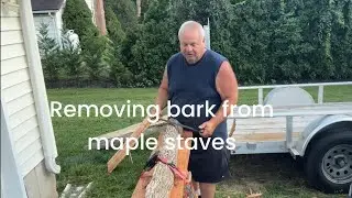 Removing bark from maple staves. By Joe Zummo
