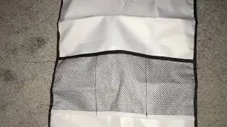 Car seat kick shield with organizational pockets