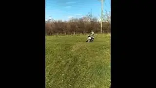 XTM electric dirt bike lithium. Age 5 wheelie time super slow mo.