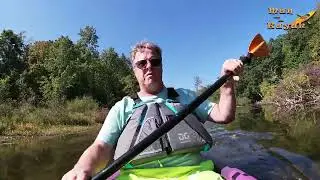 Man and his Kayak Proud Lake Recreation Area