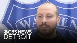 Michigan police officer hailed as hero for saving drowning child